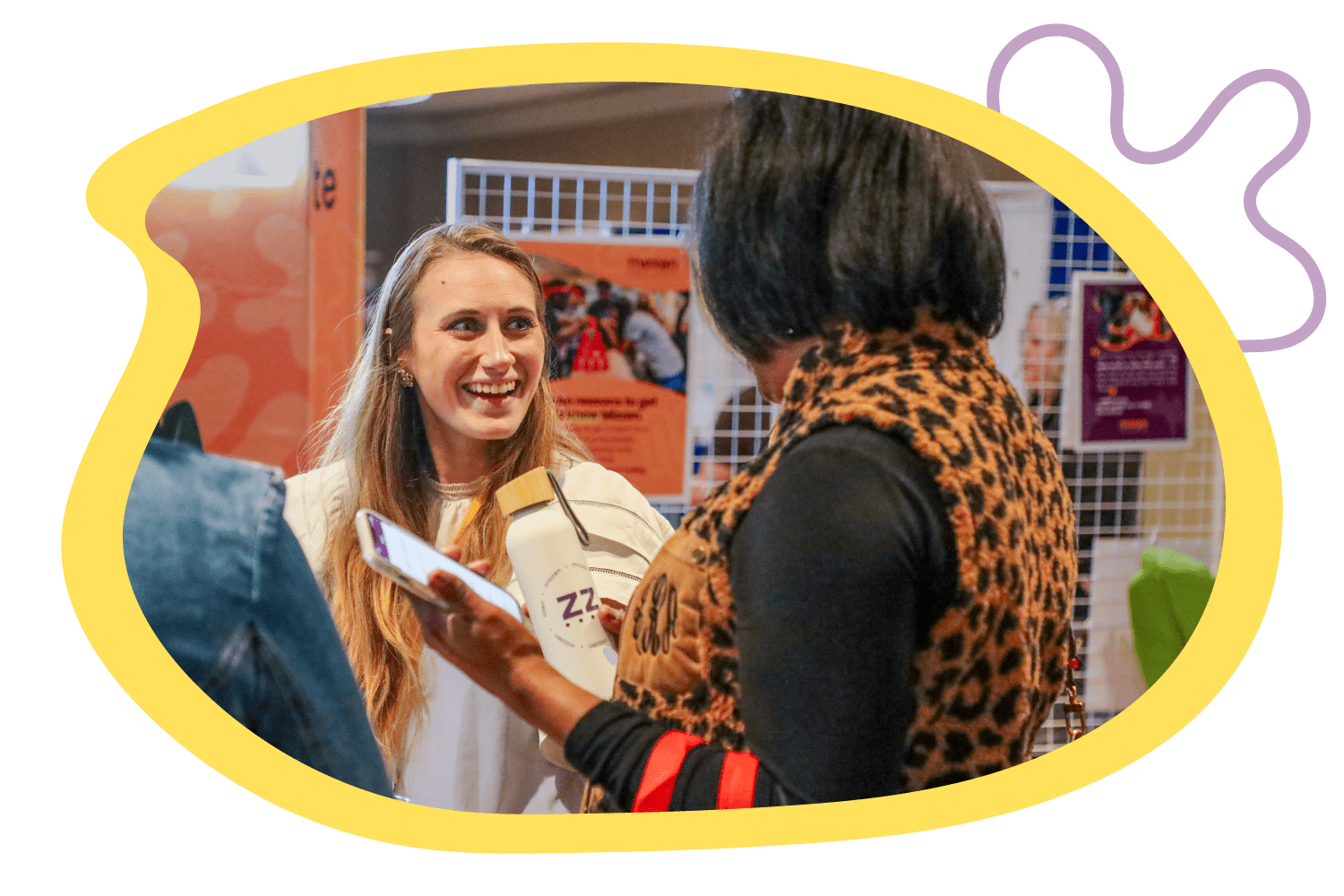 Hailee Moehnke, Projects and Events Manager at Mizzen Education, with an educator at Beyond School Hours.